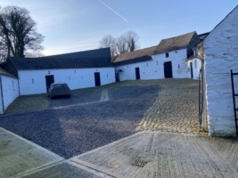 Open day at Traditional Farm Courtyard Buildings with cobblestone yard